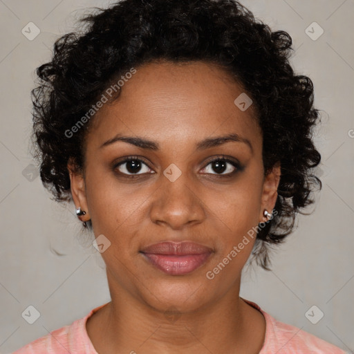 Joyful black young-adult female with medium  brown hair and brown eyes