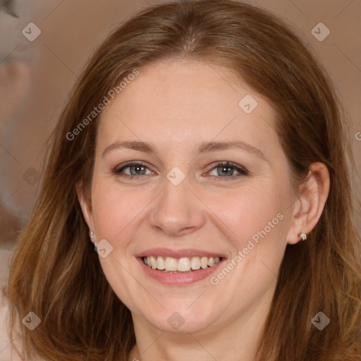 Joyful white adult female with long  brown hair and brown eyes