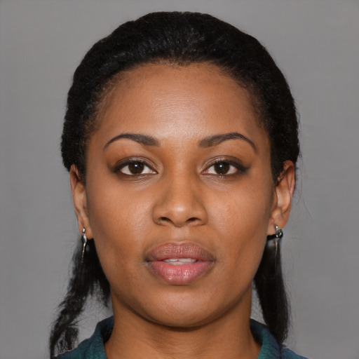 Neutral black young-adult female with medium  black hair and brown eyes
