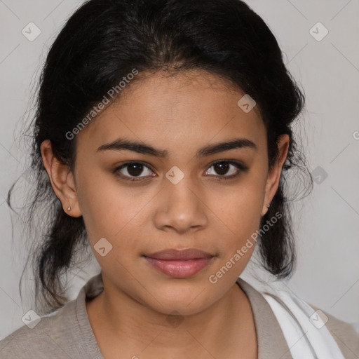 Joyful latino young-adult female with medium  brown hair and brown eyes