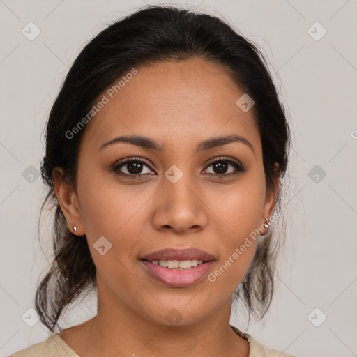 Joyful latino young-adult female with medium  brown hair and brown eyes