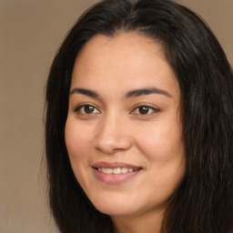 Joyful asian young-adult female with long  brown hair and brown eyes