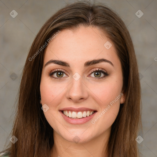 Joyful white young-adult female with long  brown hair and green eyes