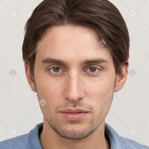 Neutral white young-adult male with short  brown hair and grey eyes