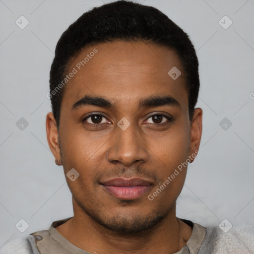 Joyful black young-adult male with short  black hair and brown eyes