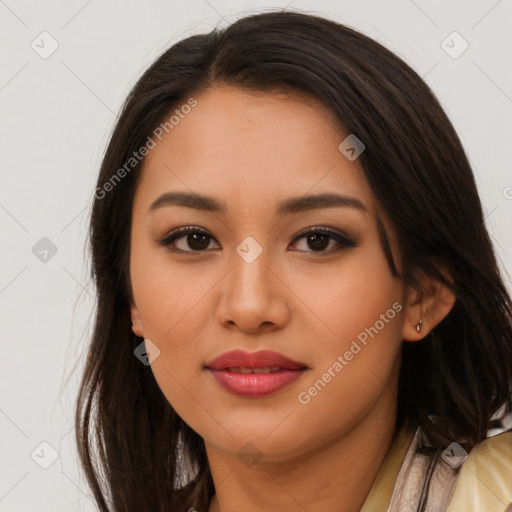 Joyful asian young-adult female with long  brown hair and brown eyes