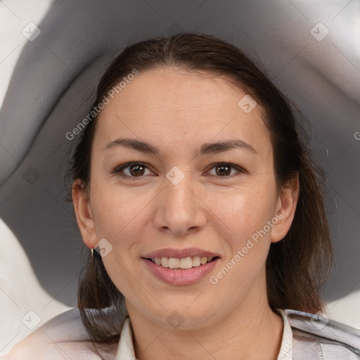 Joyful white adult female with medium  brown hair and brown eyes