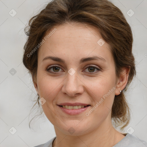 Joyful white young-adult female with medium  brown hair and green eyes