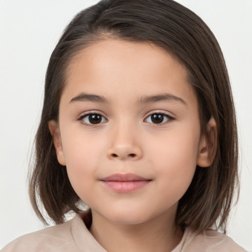 Joyful white child female with medium  brown hair and brown eyes