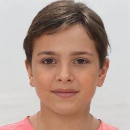 Joyful white child female with short  brown hair and brown eyes