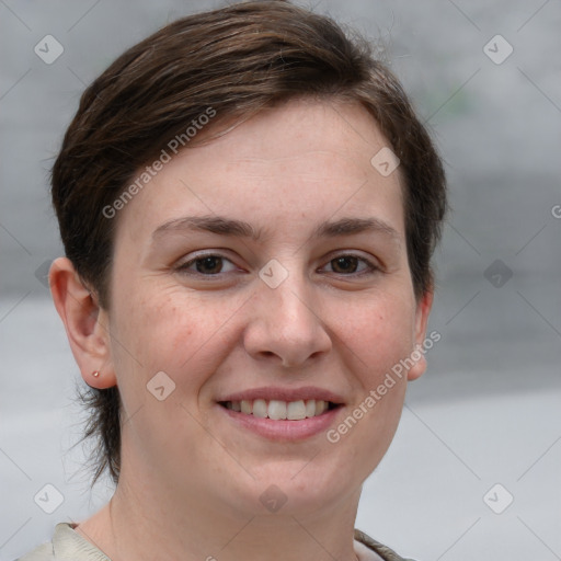 Joyful white young-adult female with short  brown hair and grey eyes