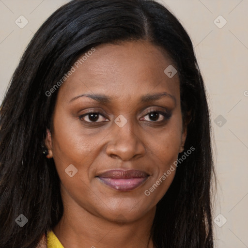 Joyful latino adult female with long  brown hair and brown eyes