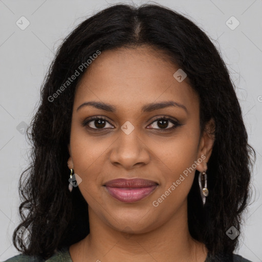 Joyful black young-adult female with long  brown hair and brown eyes