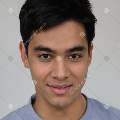 Joyful asian young-adult male with short  brown hair and brown eyes