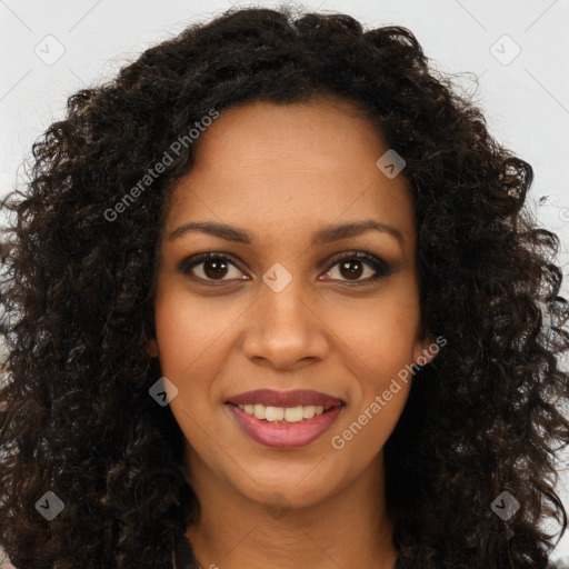 Joyful black young-adult female with long  brown hair and brown eyes