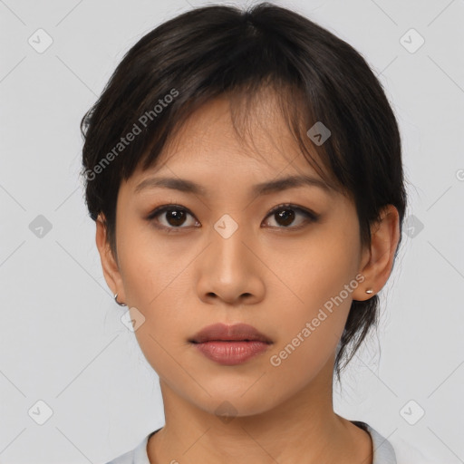 Neutral asian young-adult female with medium  brown hair and brown eyes