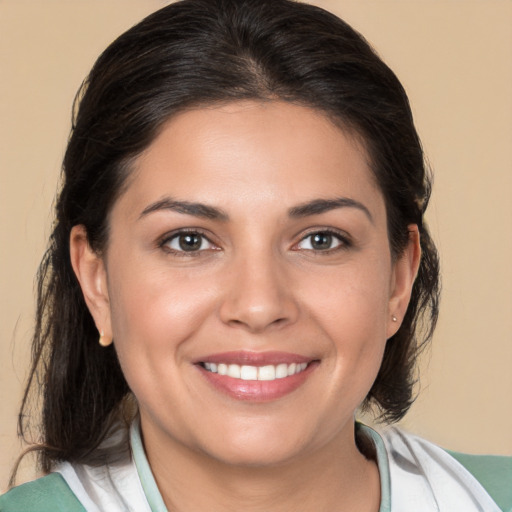 Joyful white young-adult female with medium  brown hair and brown eyes