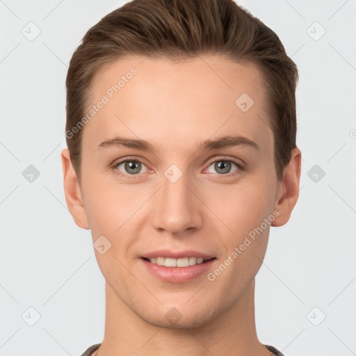 Joyful white young-adult female with short  brown hair and grey eyes