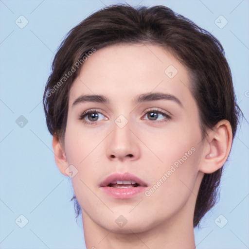 Neutral white young-adult female with medium  brown hair and brown eyes