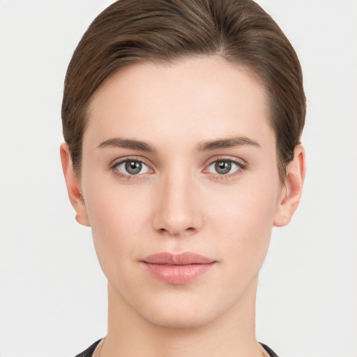 Neutral white young-adult female with short  brown hair and brown eyes