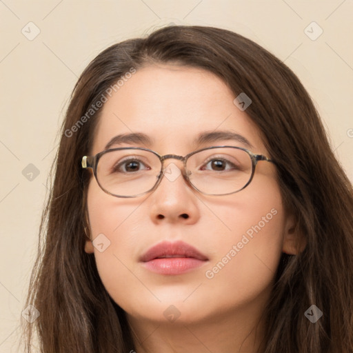 Neutral white young-adult female with long  brown hair and brown eyes