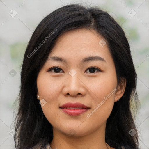 Joyful asian young-adult female with long  brown hair and brown eyes