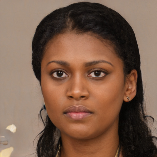 Neutral black young-adult female with long  black hair and brown eyes
