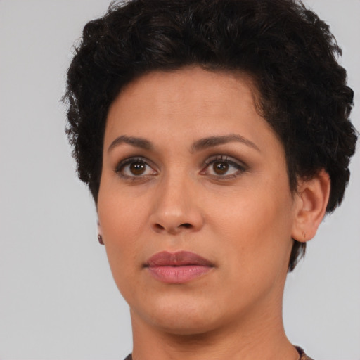 Neutral white young-adult female with short  brown hair and brown eyes