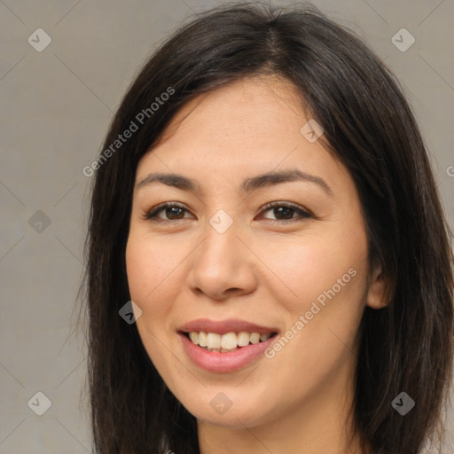 Joyful asian young-adult female with long  brown hair and brown eyes