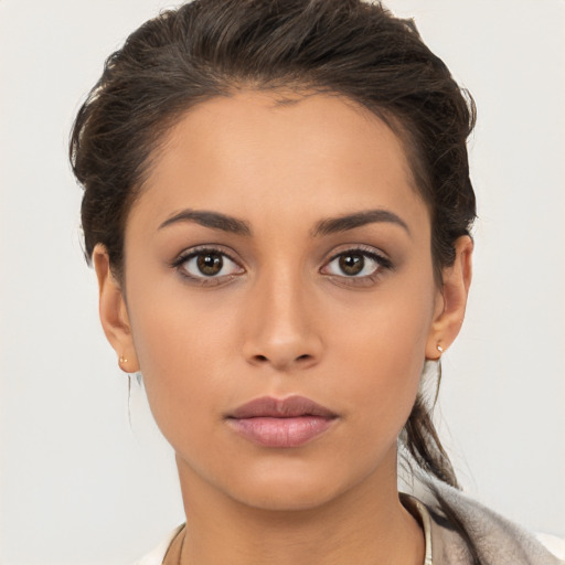 Neutral white young-adult female with short  brown hair and brown eyes