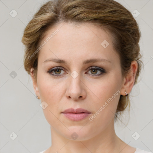 Joyful white young-adult female with medium  brown hair and green eyes