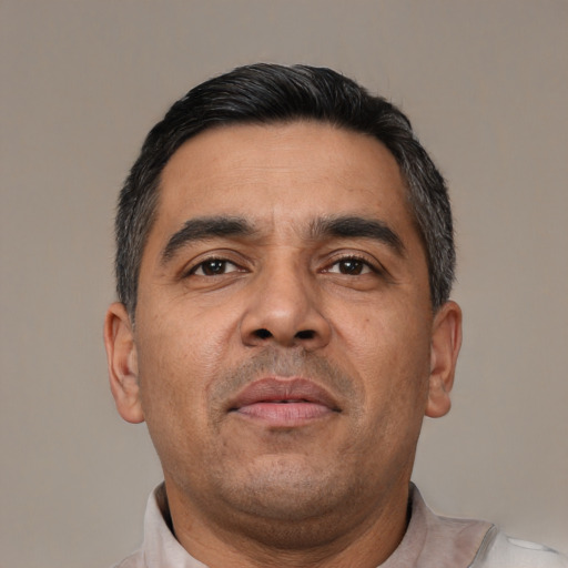 Neutral white adult male with short  black hair and brown eyes