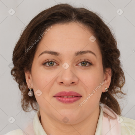 Joyful white young-adult female with medium  brown hair and green eyes