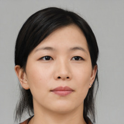 Neutral asian young-adult female with medium  black hair and brown eyes