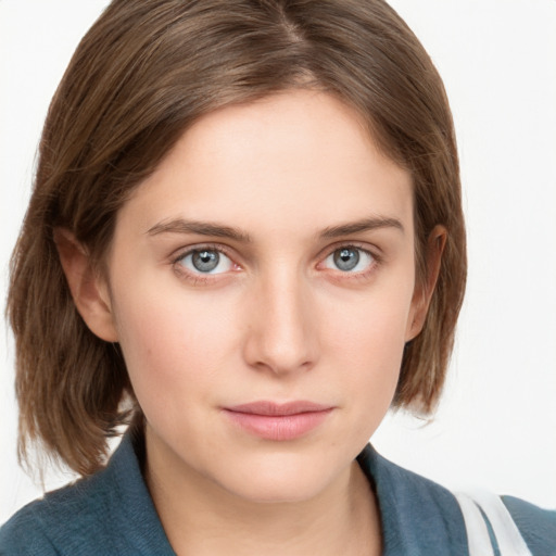 Neutral white young-adult female with medium  brown hair and grey eyes