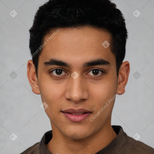 Joyful latino young-adult male with short  black hair and brown eyes