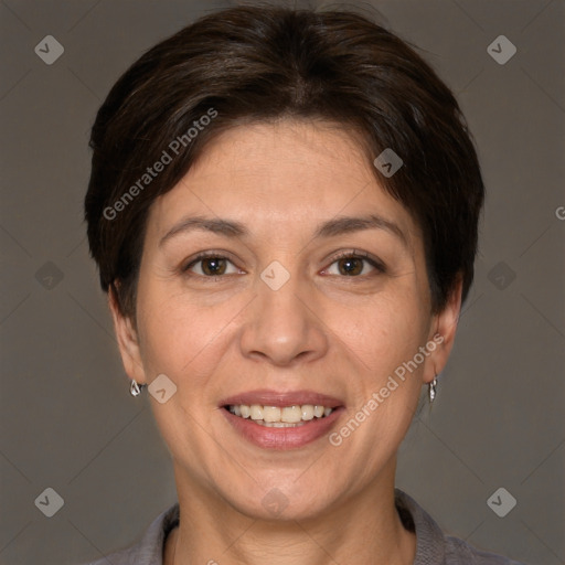 Joyful white adult female with short  brown hair and brown eyes