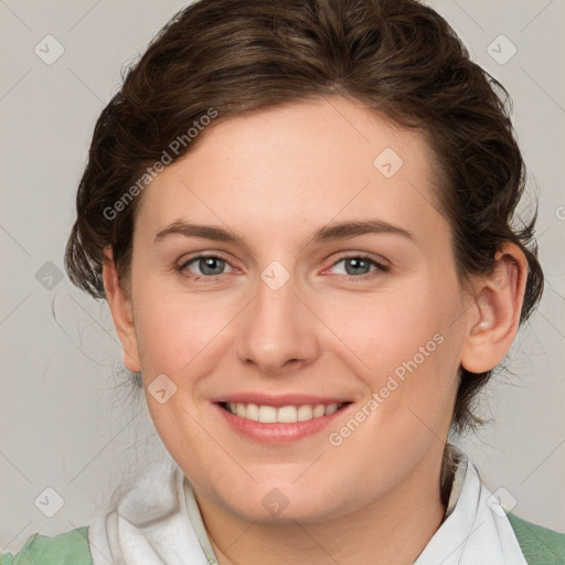 Joyful white young-adult female with medium  brown hair and blue eyes