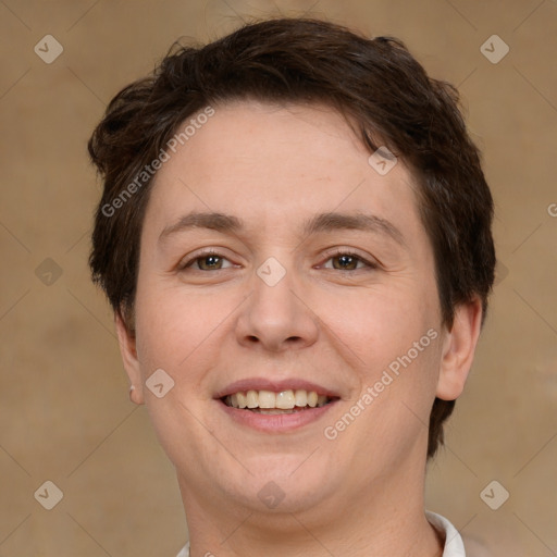 Joyful white adult female with short  brown hair and brown eyes