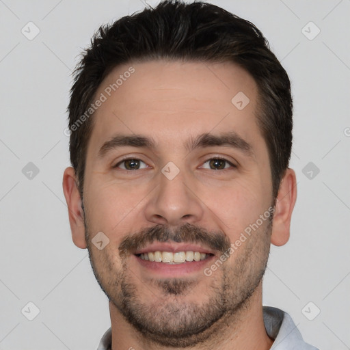 Joyful white young-adult male with short  brown hair and brown eyes