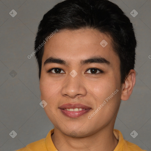 Joyful asian young-adult male with short  brown hair and brown eyes