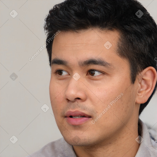 Neutral asian young-adult male with short  black hair and brown eyes