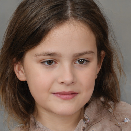 Joyful white child female with medium  brown hair and brown eyes