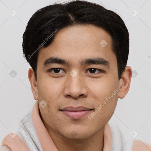 Joyful asian young-adult male with short  brown hair and brown eyes