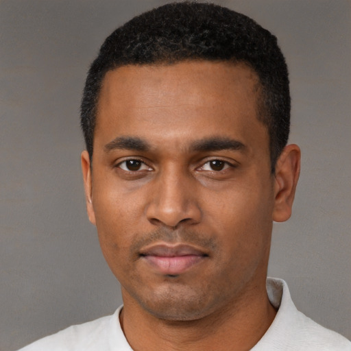 Neutral black young-adult male with short  black hair and brown eyes