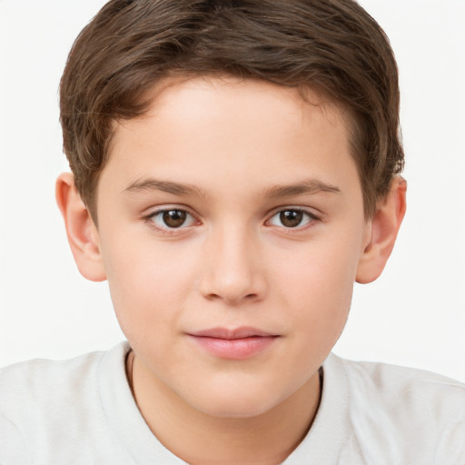 Joyful white child male with short  brown hair and brown eyes