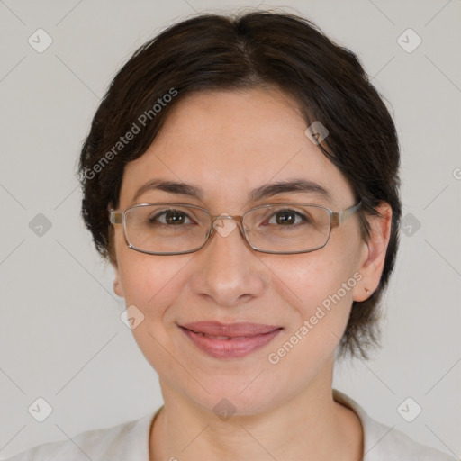 Joyful white adult female with medium  brown hair and brown eyes