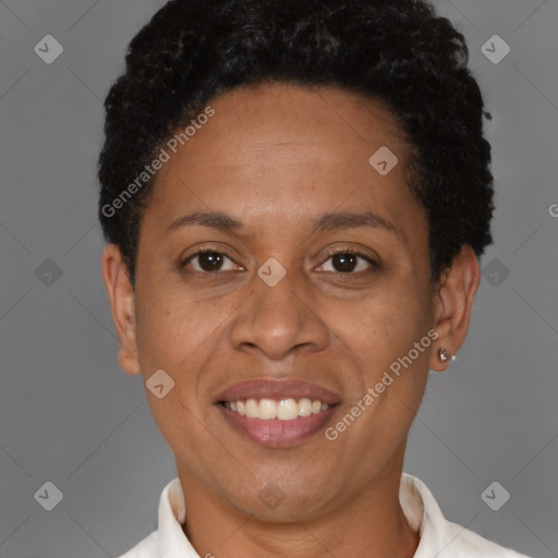 Joyful black adult female with short  brown hair and brown eyes