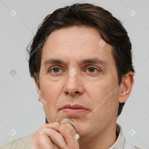 Neutral white adult male with short  brown hair and brown eyes