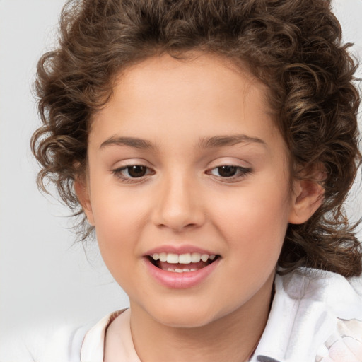 Joyful white child female with medium  brown hair and brown eyes